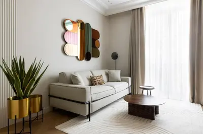 Coin salon dans l'établissement HIGHSTAY - Luxury Serviced Apartments - North Marais 2
