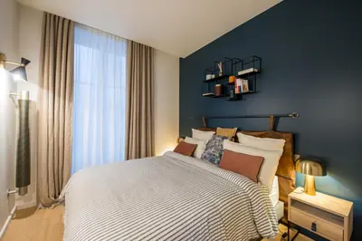 Un ou plusieurs lits dans un hébergement de l'établissement Magnifique appartement central 3 chambres / 3 BDR