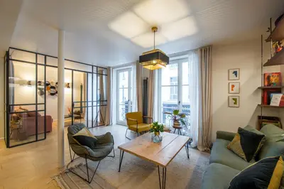 Coin salon dans l'établissement Magnifique appartement central 3 chambres / 3 BDR