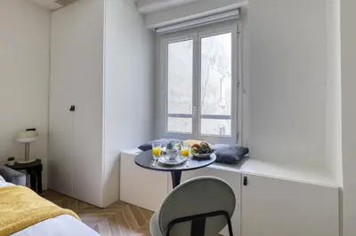 Un ou plusieurs lits dans un hébergement de l'établissement New and Designed Studio well Equipped - Heart of Paris 2