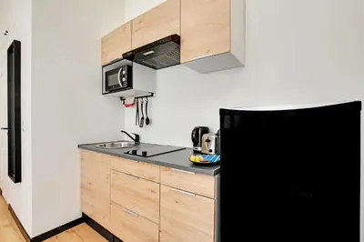 Cuisine ou kitchenette dans l'établissement Peaceful studio - 2P - Buttes-Chaumont with AC