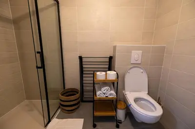 Salle de bains dans l'établissement Le royaume de Fabrice