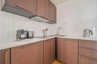 Cuisine ou kitchenette dans l'établissement Appart 4pers#2 Bedrooms#Louvres#Palais Royal#Opéra
