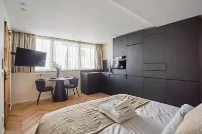 Un ou plusieurs lits dans un hébergement de l'établissement Résidence Luxembourg St Germain des Près by Studio prestige