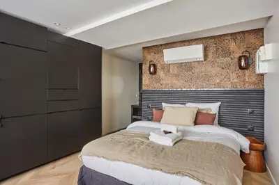 Un ou plusieurs lits dans un hébergement de l'établissement Résidence Luxembourg St Germain des Près by Studio prestige