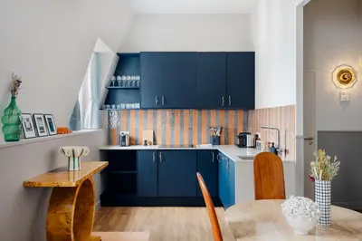 Cuisine ou kitchenette dans l'établissement Edgar Suites Montmartre - Paul Albert