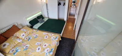 Un ou plusieurs lits dans un hébergement de l'établissement Chambre pour 4 chez Rihani près de la Tour Eiffel