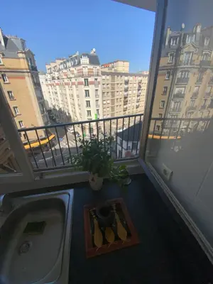 Balcon ou terrasse dans l'établissement Chambre pour 4 chez Rihani près de la Tour Eiffel