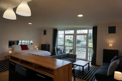 Un ou plusieurs lits dans un hébergement de l'établissement Résidences Grande Jatte, Face Seine, Suites Luxe 52m2 à 97m2, Hôpital Américain à 600m