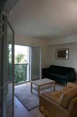 Coin salon dans l'établissement Résidences Grande Jatte, Face Seine, Suites Luxe 52m2 à 97m2, Hôpital Américain à 600m