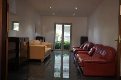 Coin salon dans l'établissement Résidences Grande Jatte, Face Seine, Suites Luxe 52m2 à 97m2, Hôpital Américain à 600m
