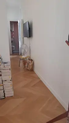 Télévision ou salle de divertissement dans l'établissement Au cœur du quartier Latin