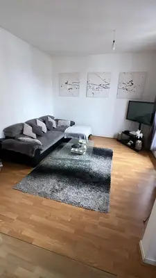 Coin salon dans l'établissement Appartement 60 m², porte de Saint-Cloud
