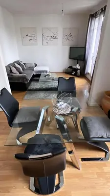 Coin salon dans l'établissement Appartement 60 m², porte de Saint-Cloud