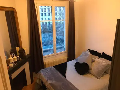 Un ou plusieurs lits dans un hébergement de l'établissement Appartement 60 m², porte de Saint-Cloud