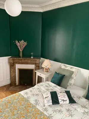 Un ou plusieurs lits dans un hébergement de l'établissement Cosy appartement in Paris