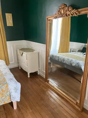 Un ou plusieurs lits dans un hébergement de l'établissement Cosy appartement in Paris