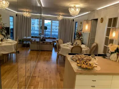 Coin salon dans l'établissement Appartement Belle Feuille