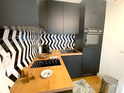 Cuisine ou kitchenette dans l'établissement L'appartement Letac