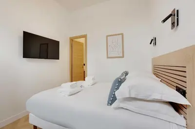Un ou plusieurs lits dans un hébergement de l'établissement Superbe appartement - 2BR-6P - Bastille