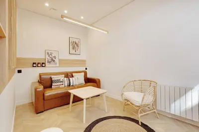 Coin salon dans l'établissement Superbe appartement - 2BR-6P - Bastille