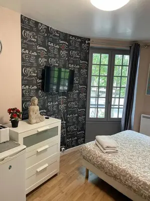 Un ou plusieurs lits dans un hébergement de l'établissement Studio Montsouris
