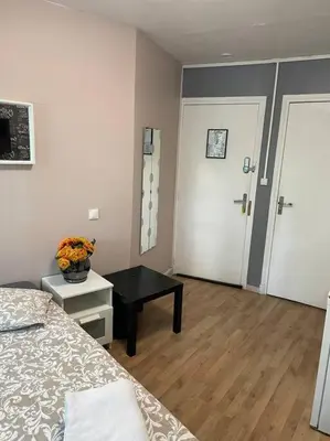 Un ou plusieurs lits dans un hébergement de l'établissement Studio Montsouris