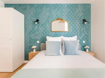 Un ou plusieurs lits dans un hébergement de l'établissement Merveil - Family Suite - Tour Eiffel - Finlay