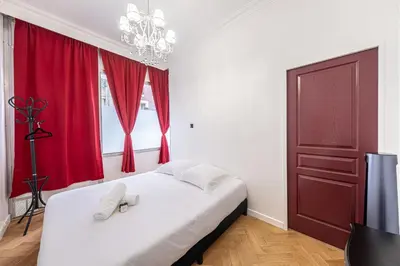 Un ou plusieurs lits dans un hébergement de l'établissement Villa Montmartre 4P-Sacré Cœur