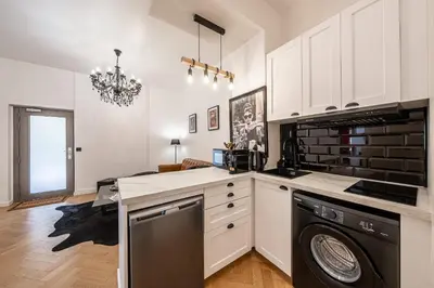 Cuisine ou kitchenette dans l'établissement Villa Montmartre 4P-Sacré Cœur