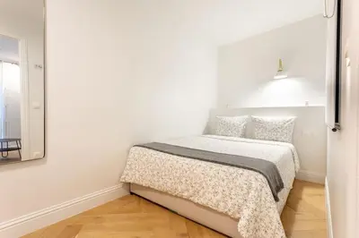 Un ou plusieurs lits dans un hébergement de l'établissement Luxury Living in Louvre
