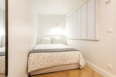 Un ou plusieurs lits dans un hébergement de l'établissement Luxury Living in Louvre
