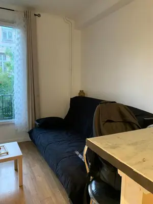 Coin salon dans l'établissement Studio renovated in the heart of Paris