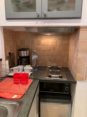 Cuisine ou kitchenette dans l'établissement Studio renovated in the heart of Paris