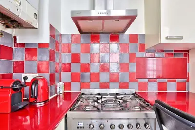Cuisine ou kitchenette dans l'établissement Arc de Triomphe Superbe Appartement Paris Free Netflix