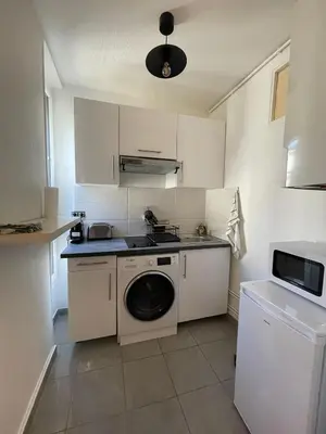 Cuisine ou kitchenette dans l'établissement Paris Eiffel Flats