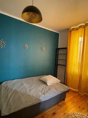 Un ou plusieurs lits dans un hébergement de l'établissement Paris Eiffel Flats