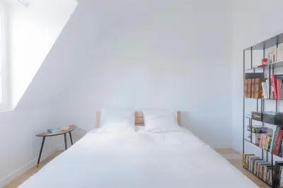 Un ou plusieurs lits dans un hébergement de l'établissement Loft Saint-Germain des près Vavin