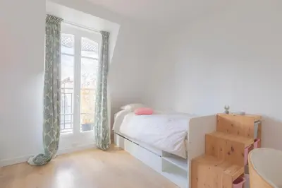 Un ou plusieurs lits dans un hébergement de l'établissement Loft Saint-Germain des près Vavin