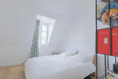 Un ou plusieurs lits dans un hébergement de l'établissement Loft Saint-Germain des près Vavin