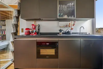 Cuisine ou kitchenette dans l'établissement Appartement Sulpice - Welkeys