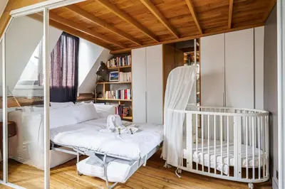 Un ou plusieurs lits dans un hébergement de l'établissement Appartement Sulpice - Welkeys