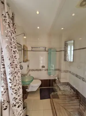 Salle de bains dans l'établissement Superbe logement au centre de Paris