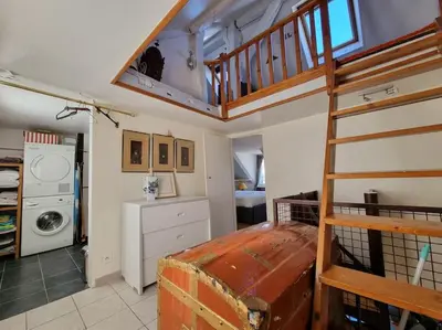 Cuisine ou kitchenette dans l'établissement Superbe logement au centre de Paris