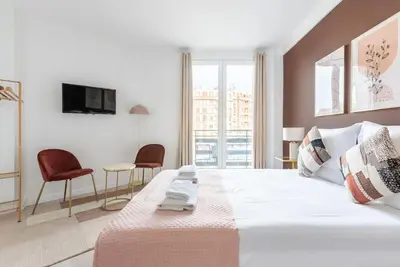 Un ou plusieurs lits dans un hébergement de l'établissement Studio lumineux Paris Est - Serurier