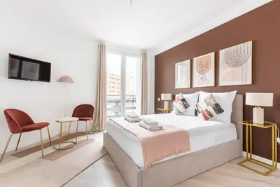 Un ou plusieurs lits dans un hébergement de l'établissement Studio lumineux Paris Est - Serurier