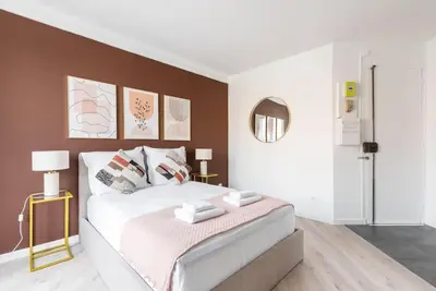 Un ou plusieurs lits dans un hébergement de l'établissement Studio lumineux Paris Est - Serurier