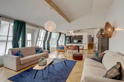 Coin salon dans l'établissement 265 Suite Antoine - Superbe Appartement à Paris