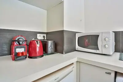 Cuisine ou kitchenette dans l'établissement Studio - Appartement Quartier Montparnasse 2 Free Netflix