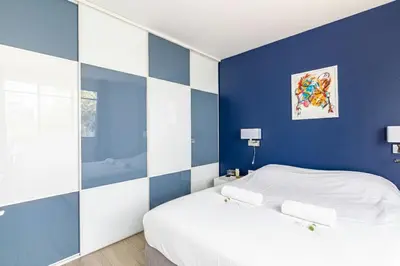 Un ou plusieurs lits dans un hébergement de l'établissement GuestReady - Appartement Lumineux au 15ème